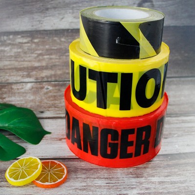 Black yellow and red caution tapes danger barrier tapes